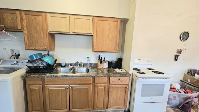 kitchen featuring sink, white electric range, and washer / dryer