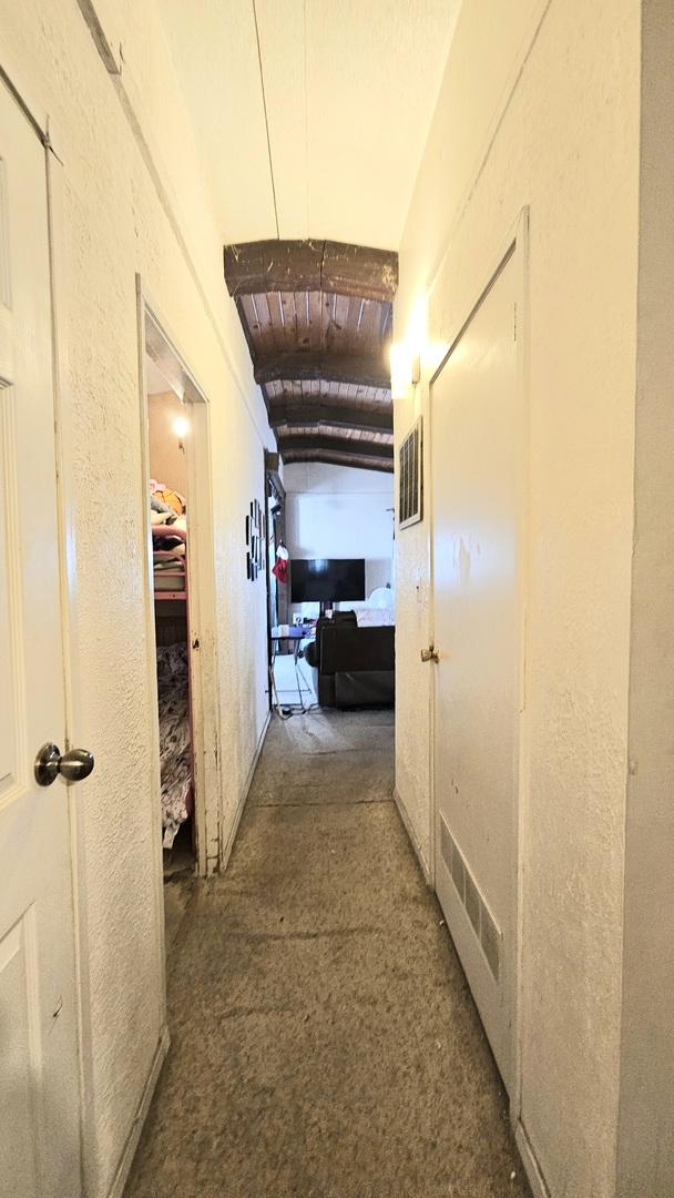 hallway with wood ceiling