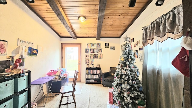 recreation room featuring vaulted ceiling with beams and wood ceiling