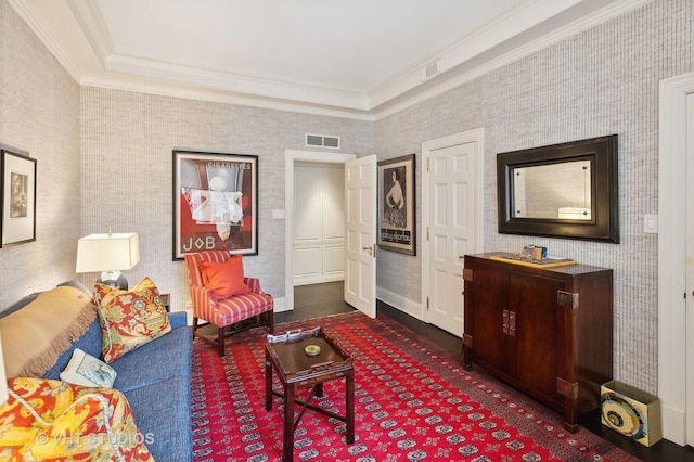 living room with ornamental molding