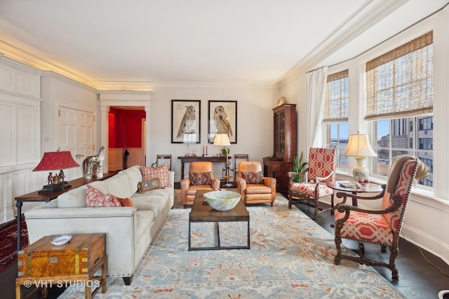 living room featuring hardwood / wood-style floors and ornamental molding