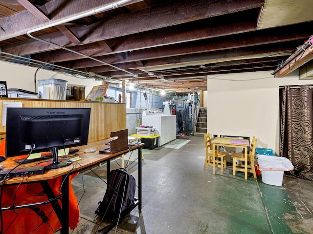 basement with washing machine and clothes dryer