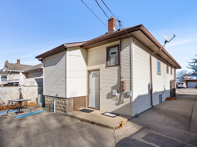 rear view of house featuring a patio