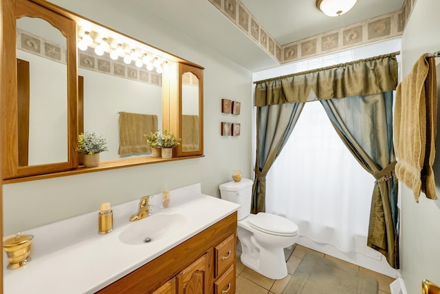 full bathroom featuring shower / tub combo, tile patterned floors, vanity, baseboard heating, and toilet