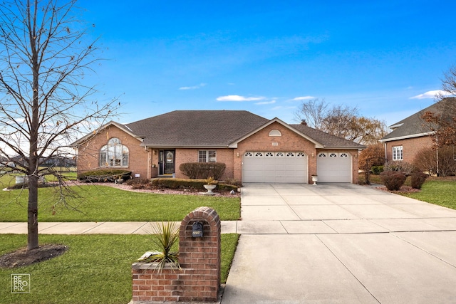 ranch-style house featuring a garage and a front yard