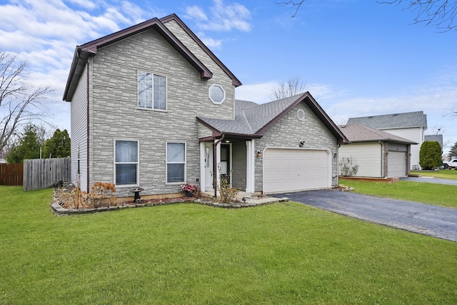 front of property with a front yard and a garage