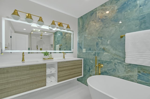 bathroom featuring vanity and a bathing tub