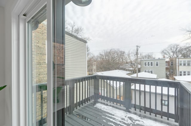 view of snow covered deck