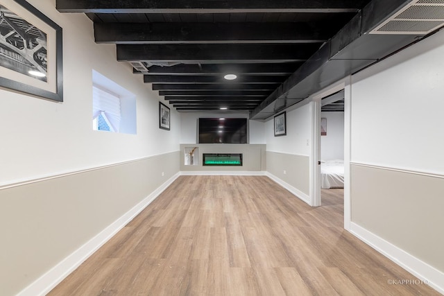 basement with light wood-type flooring