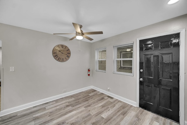 entrance foyer featuring light hardwood / wood-style floors and ceiling fan