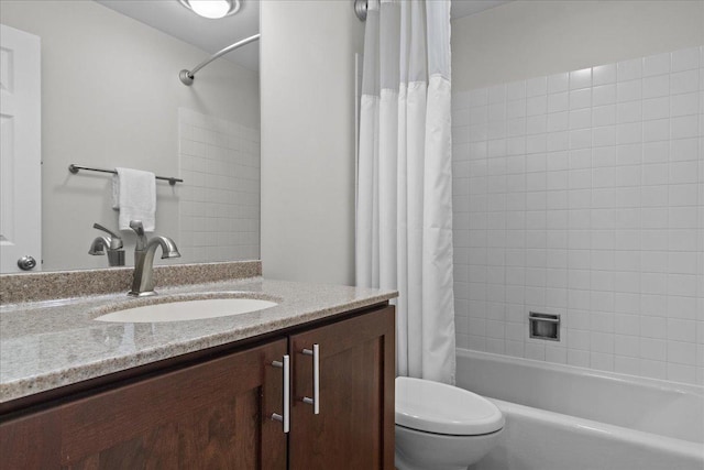 full bathroom featuring vanity, toilet, and shower / bathtub combination with curtain