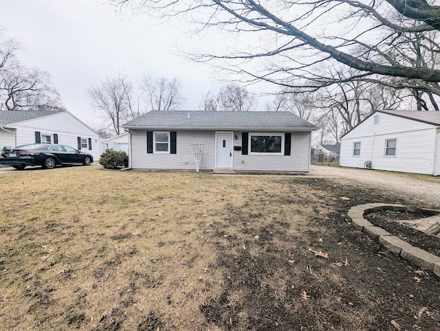 view of front of home featuring a front yard