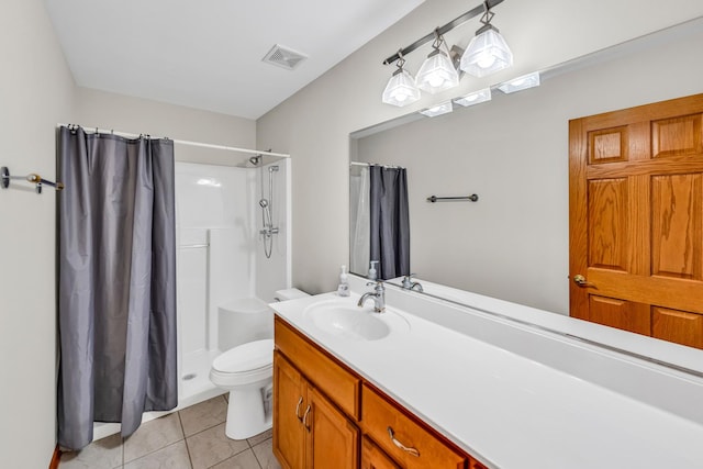 bathroom with tile patterned floors, vanity, toilet, and a shower with shower curtain