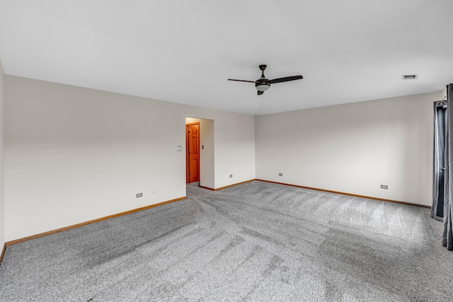 empty room with carpet flooring and ceiling fan