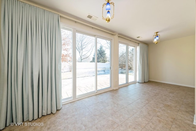 view of tiled spare room