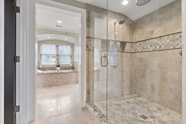 bathroom featuring plus walk in shower