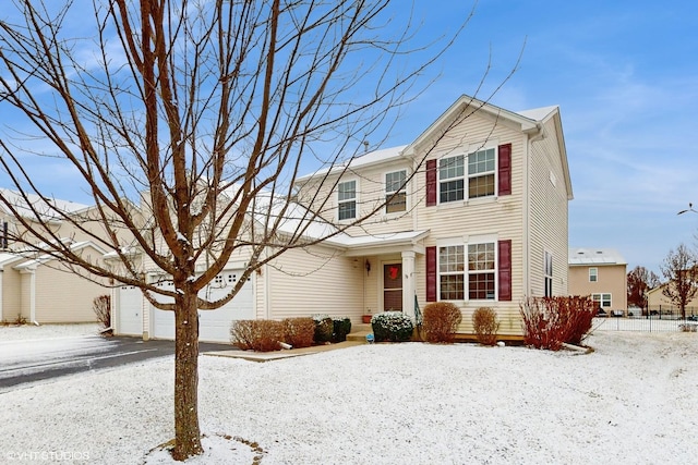 front of property featuring a garage