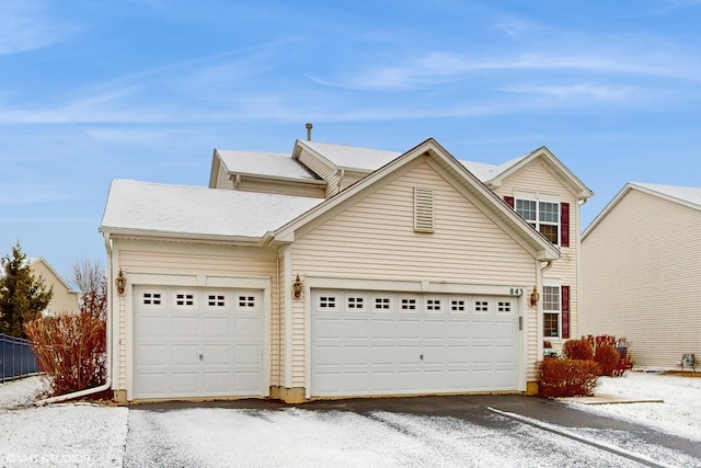 view of front of home with a garage