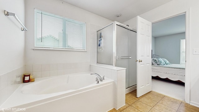 bathroom with plus walk in shower and tile patterned floors