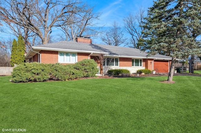 ranch-style house with a front lawn and a garage