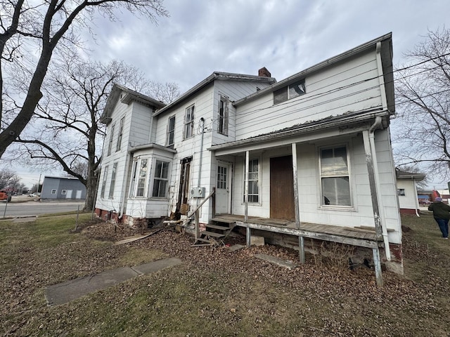 view of front of property featuring covered porch