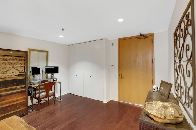 office area featuring dark wood-type flooring