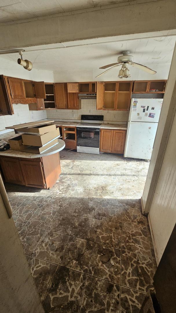 kitchen featuring white appliances, ventilation hood, ceiling fan, and rail lighting