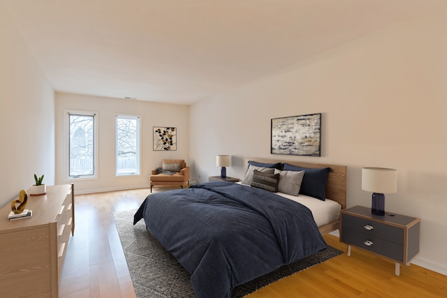 bedroom featuring hardwood / wood-style flooring