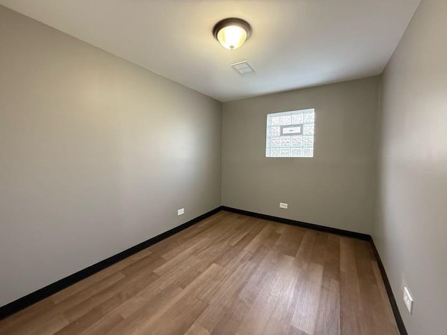 empty room with light wood-type flooring