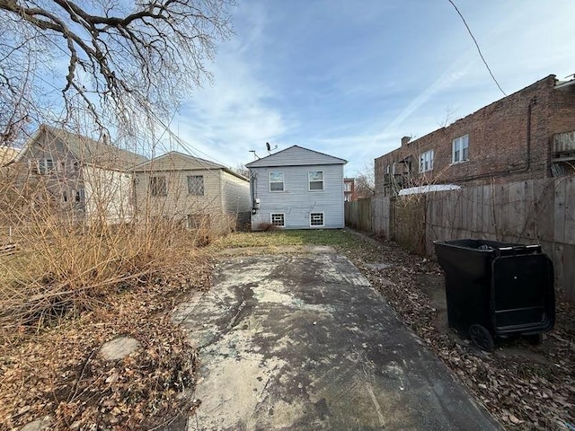 rear view of house featuring a patio