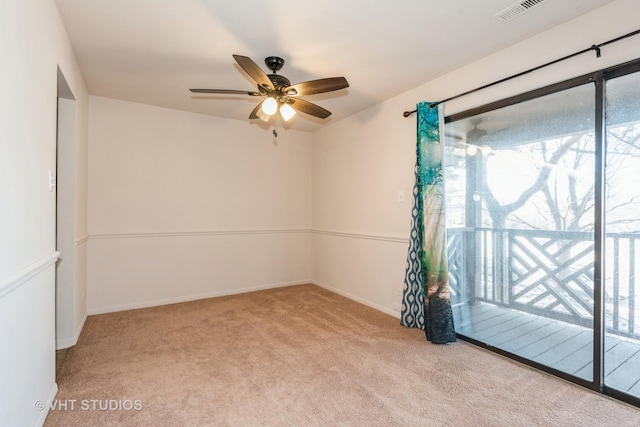 carpeted empty room with ceiling fan