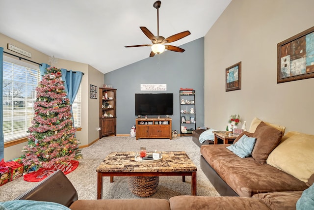 living room with carpet, ceiling fan, and vaulted ceiling