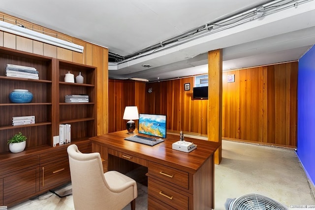 home office featuring wood walls