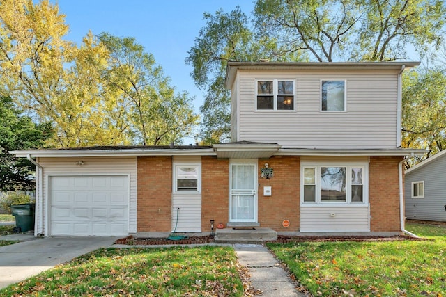 front facade with a front yard and a garage