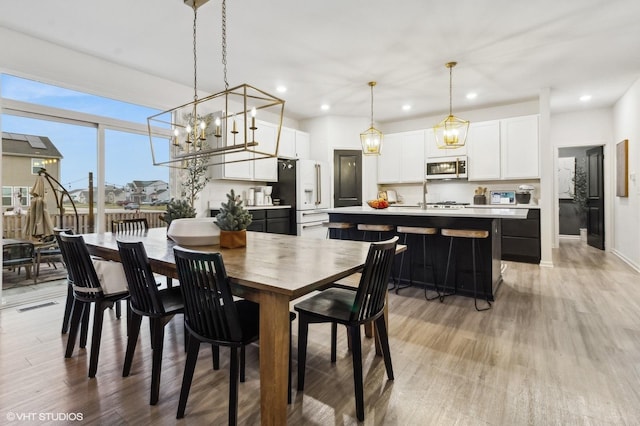 dining area with light wood-type flooring