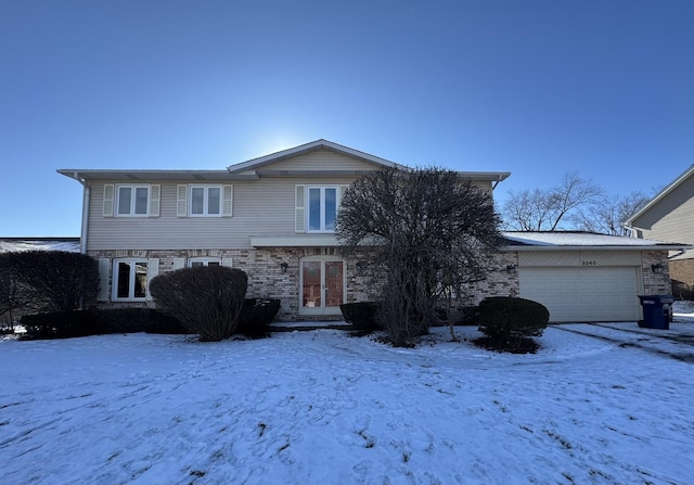 front of property with a garage