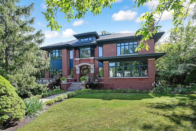 view of front facade with a front yard