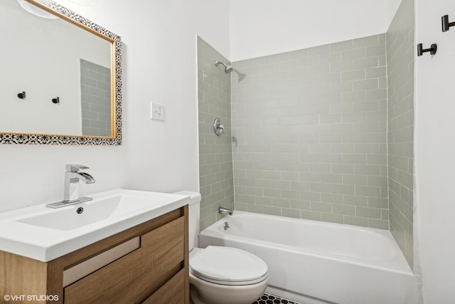 full bathroom with bathtub / shower combination, vanity, and toilet