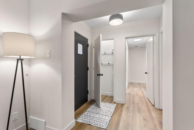 hallway featuring light hardwood / wood-style floors