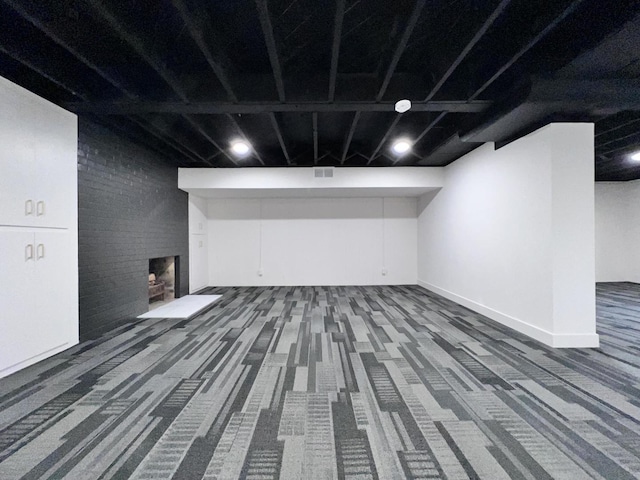 basement featuring carpet