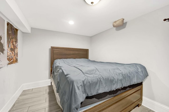 bedroom with light hardwood / wood-style flooring