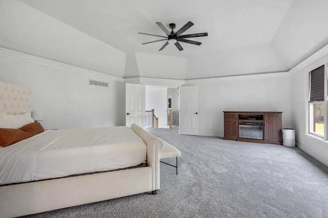 carpeted bedroom with lofted ceiling and ceiling fan