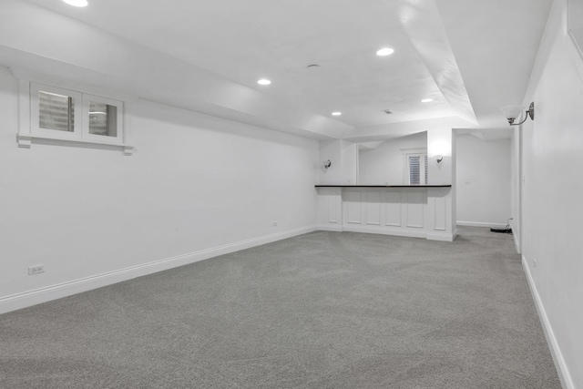 basement with light carpet