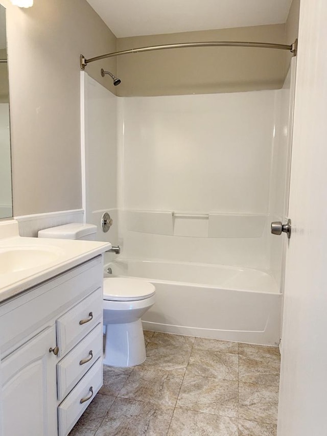 full bathroom with toilet, vanity, and tub / shower combination