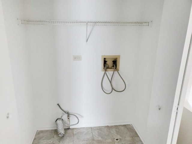 clothes washing area with washer hookup