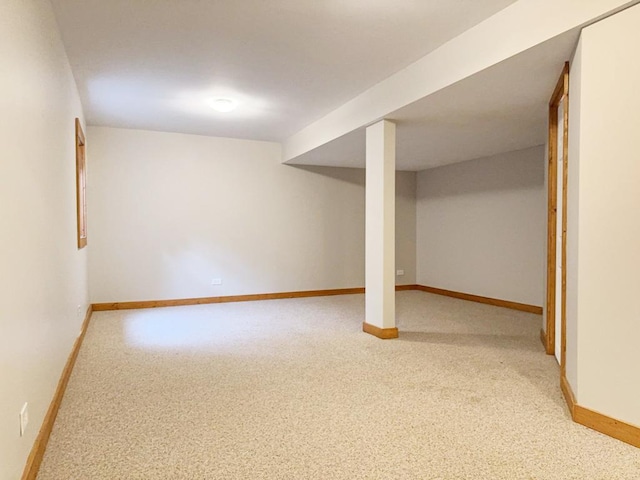 basement with light colored carpet