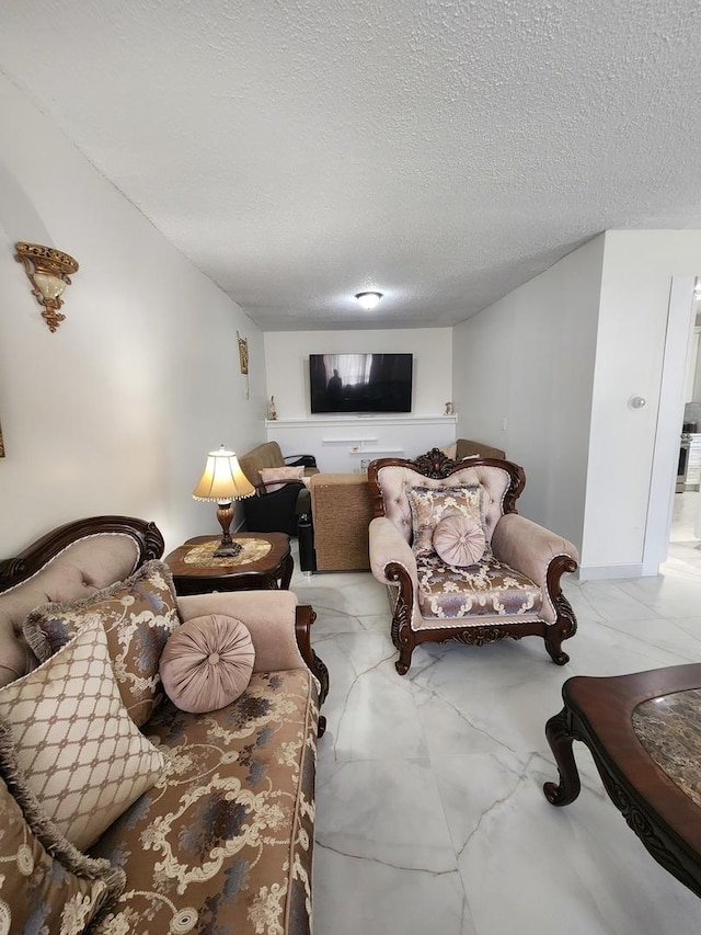 living room with a textured ceiling