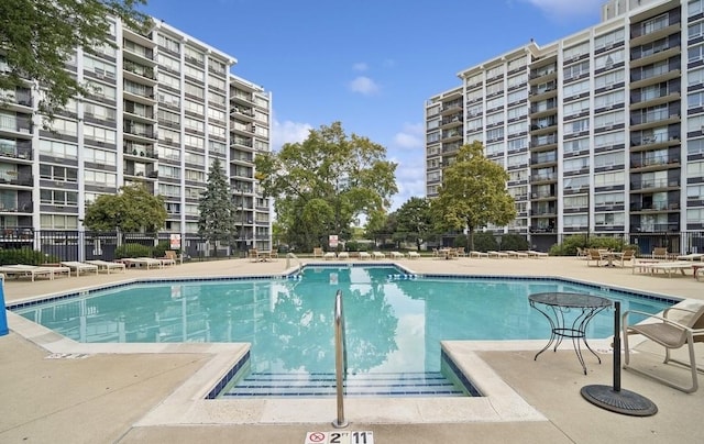 view of swimming pool featuring a patio