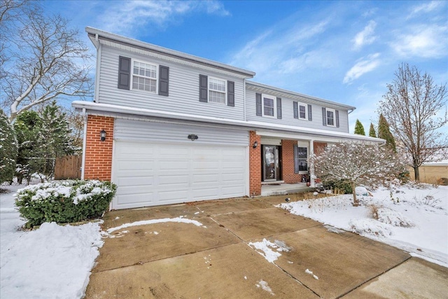 front of property with a garage