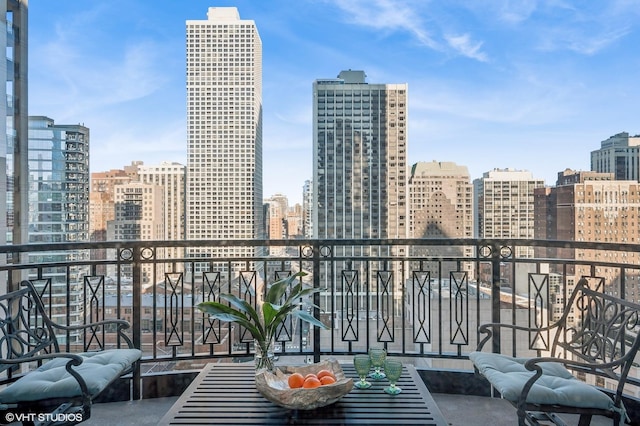 balcony featuring a view of city